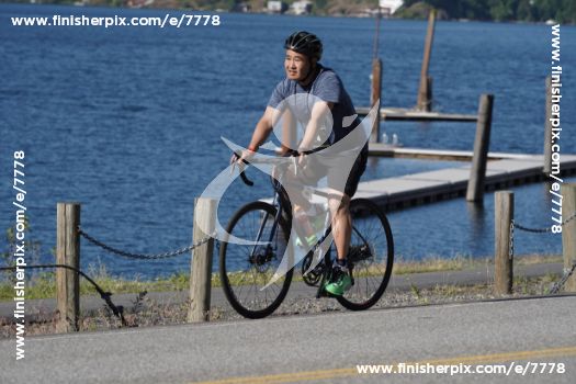 How I Finished an Ironman 70.3 on Zero Training (and a Facebook Marketplace Bike) 1 Dennis Yu riding the bike he bought off Facebook Marketplace along Lake Coeur d'Alene during Ironman 70.3
