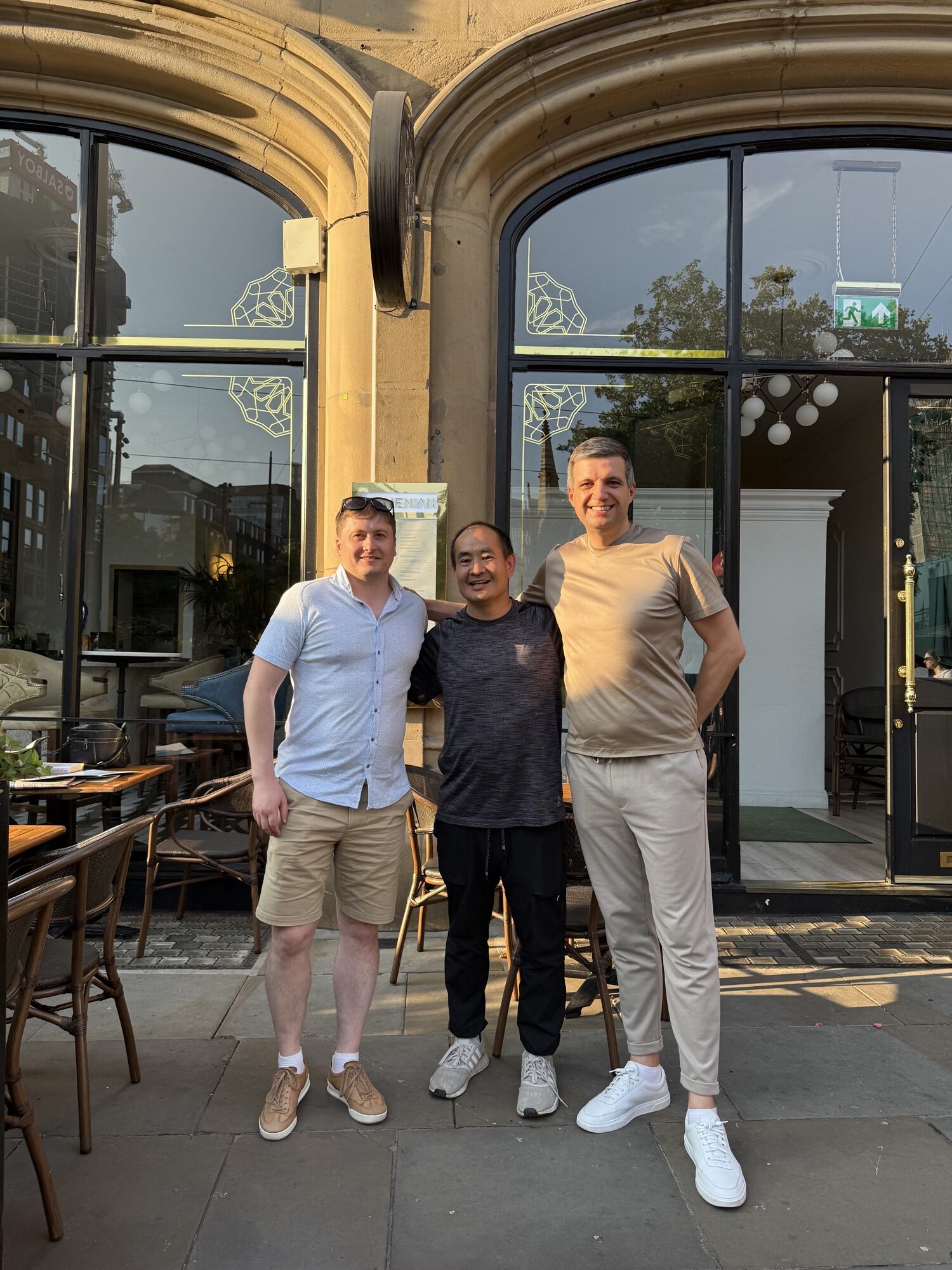 Paul Ryazanov with Dennis Yu and a colleague in Manchester, July 2026