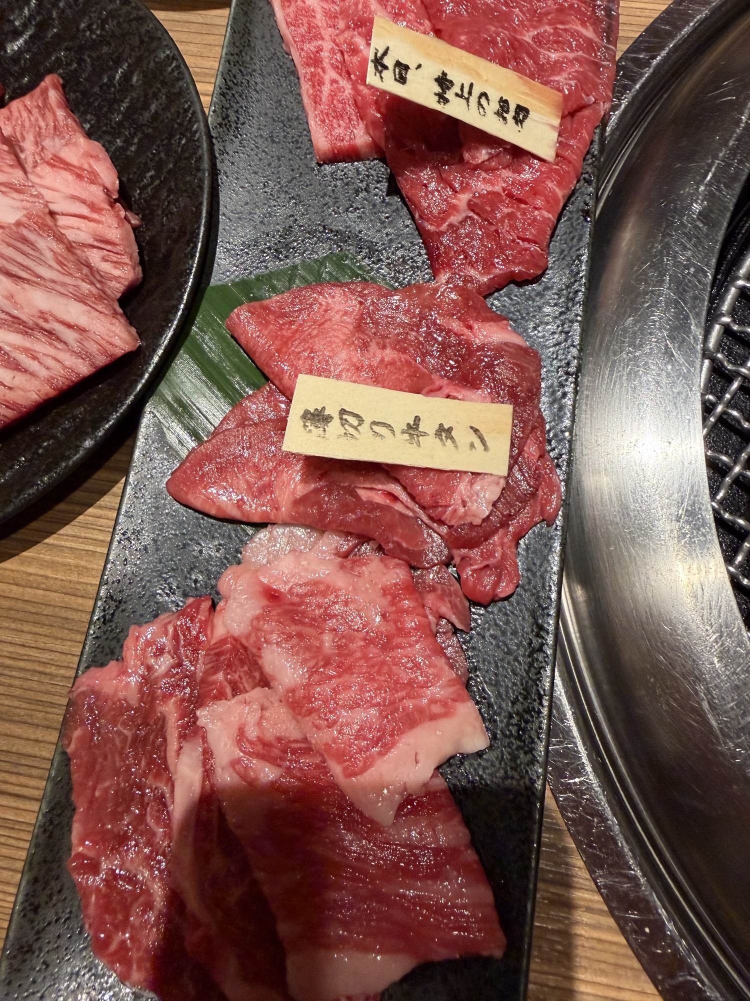 Meatings in Tokyo: Why I Love to EEAT With Good Friends 2 Welcome rare-cut platter at Black Hole Shinjuku with handwritten wooden tags on raw Japanese wagyu