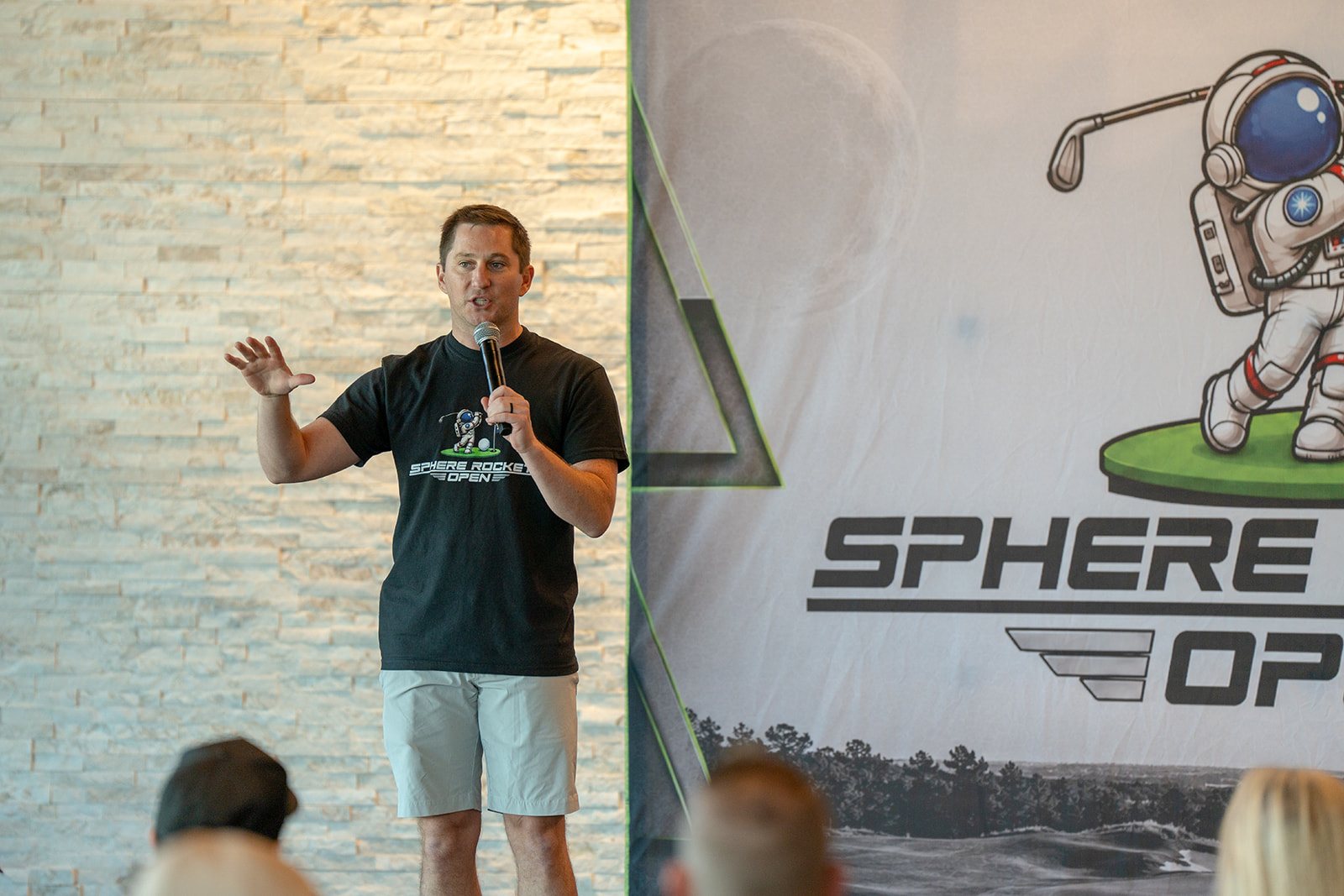 Ben Harris, CMO of Sphere Rocket, speaking on stage