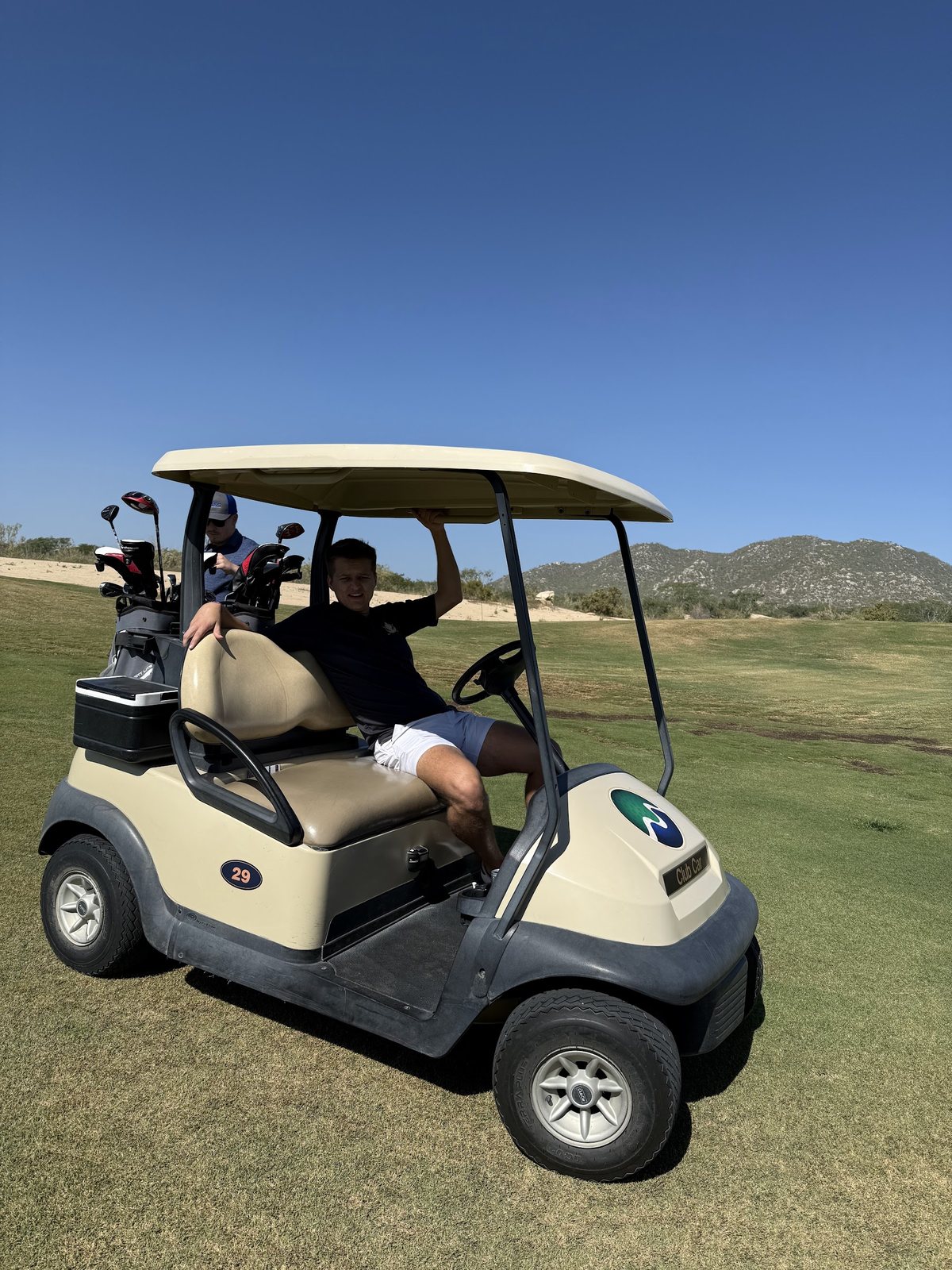 Marko Sipila driving a golf cart, November 2024