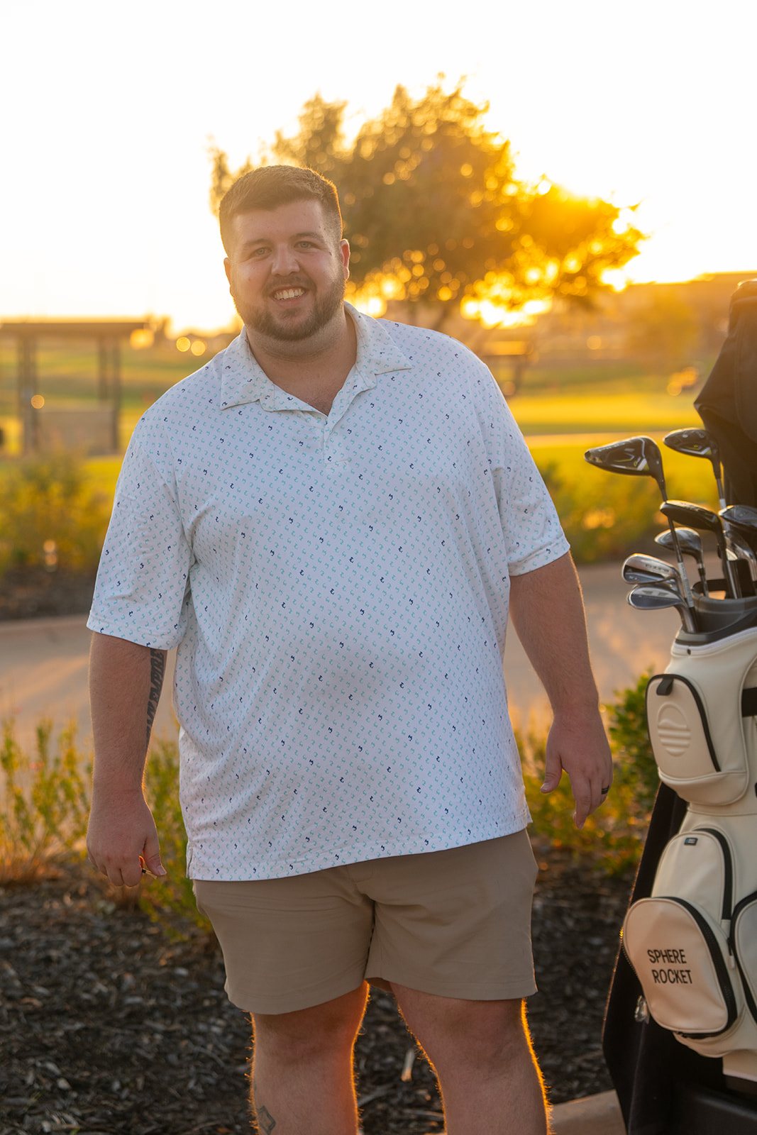 Justin Nelson, founder of Sphere Rocket, on the golf course at sunset