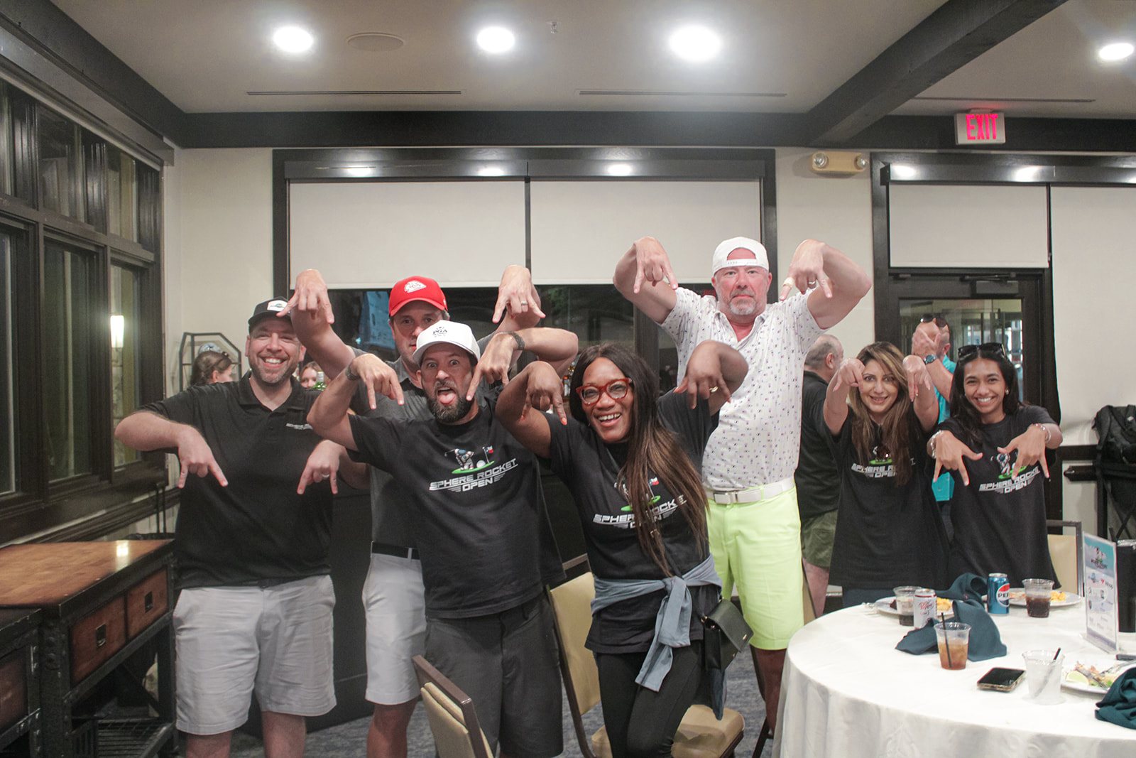 Group celebration on the last night of the Sphere Rocket Open
