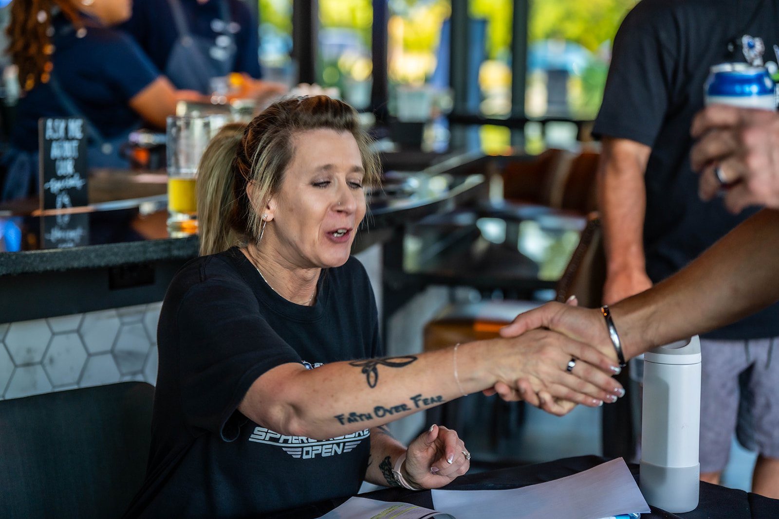 Traci Nelson, Chief of Staff at Sphere Rocket, at the check-in desk on opening night