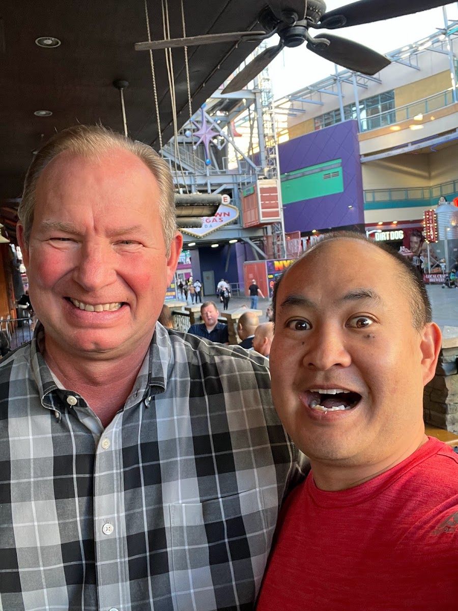 Dennis Yu with Tom Hawkins